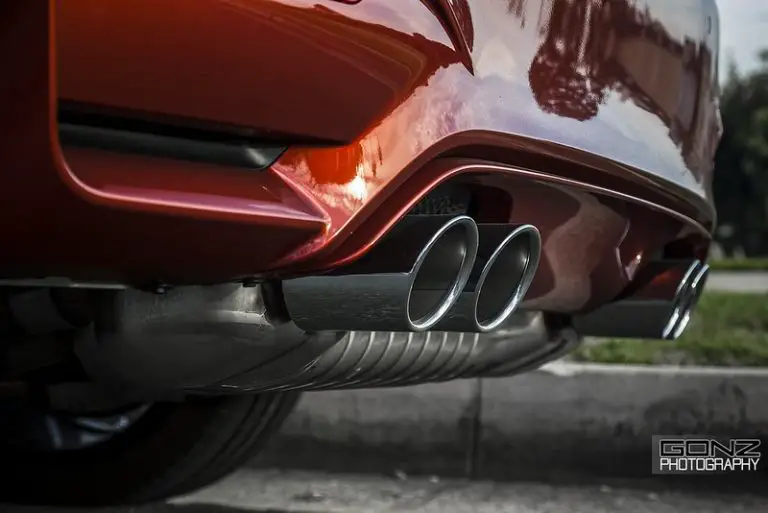 How far should exhaust tips stick out
