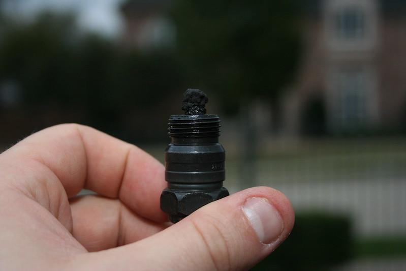 Can bad spark plugs cause lean condition